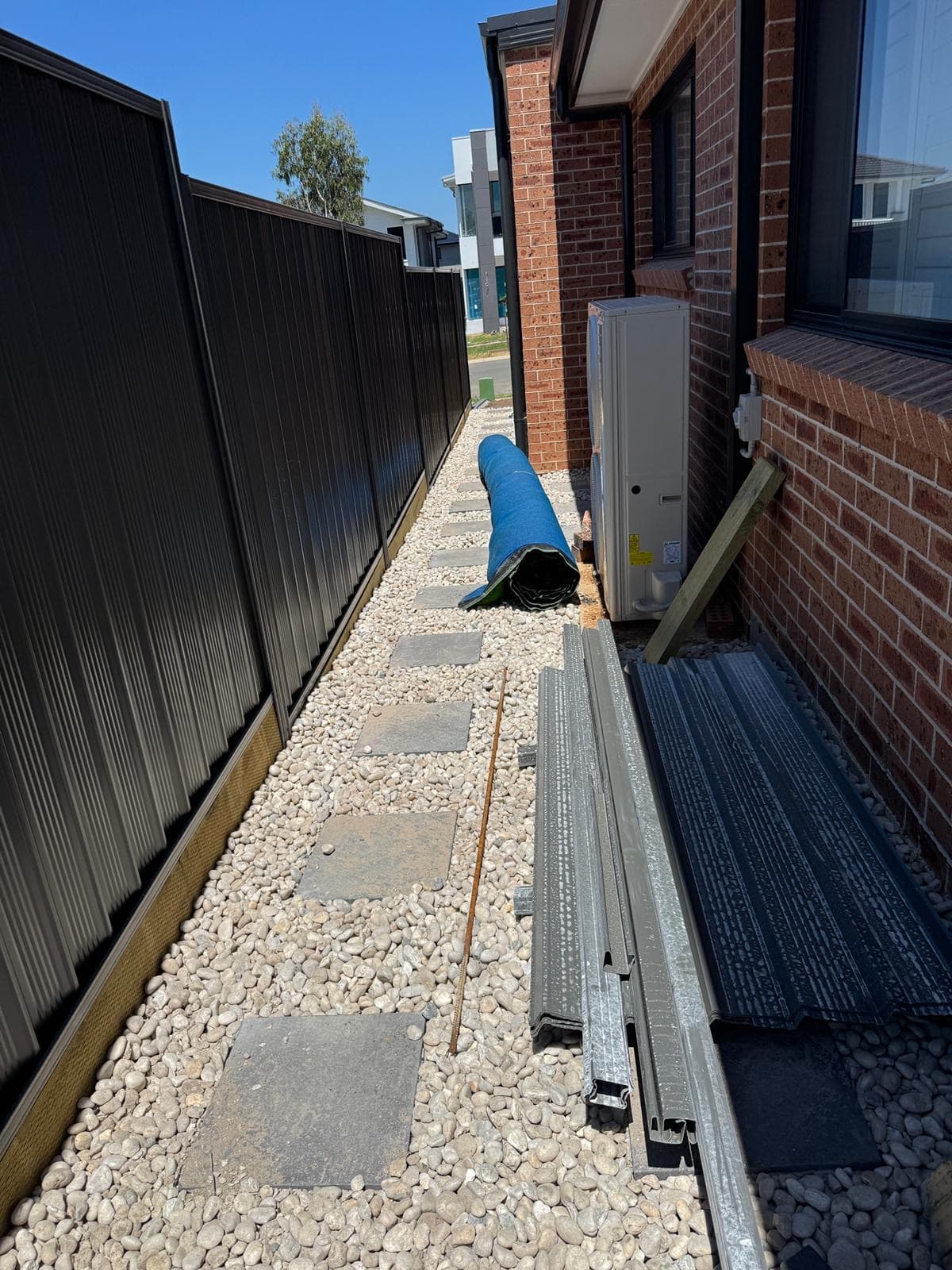 Complete landscape construction Sydney - new turf installation with treated pine garden edging