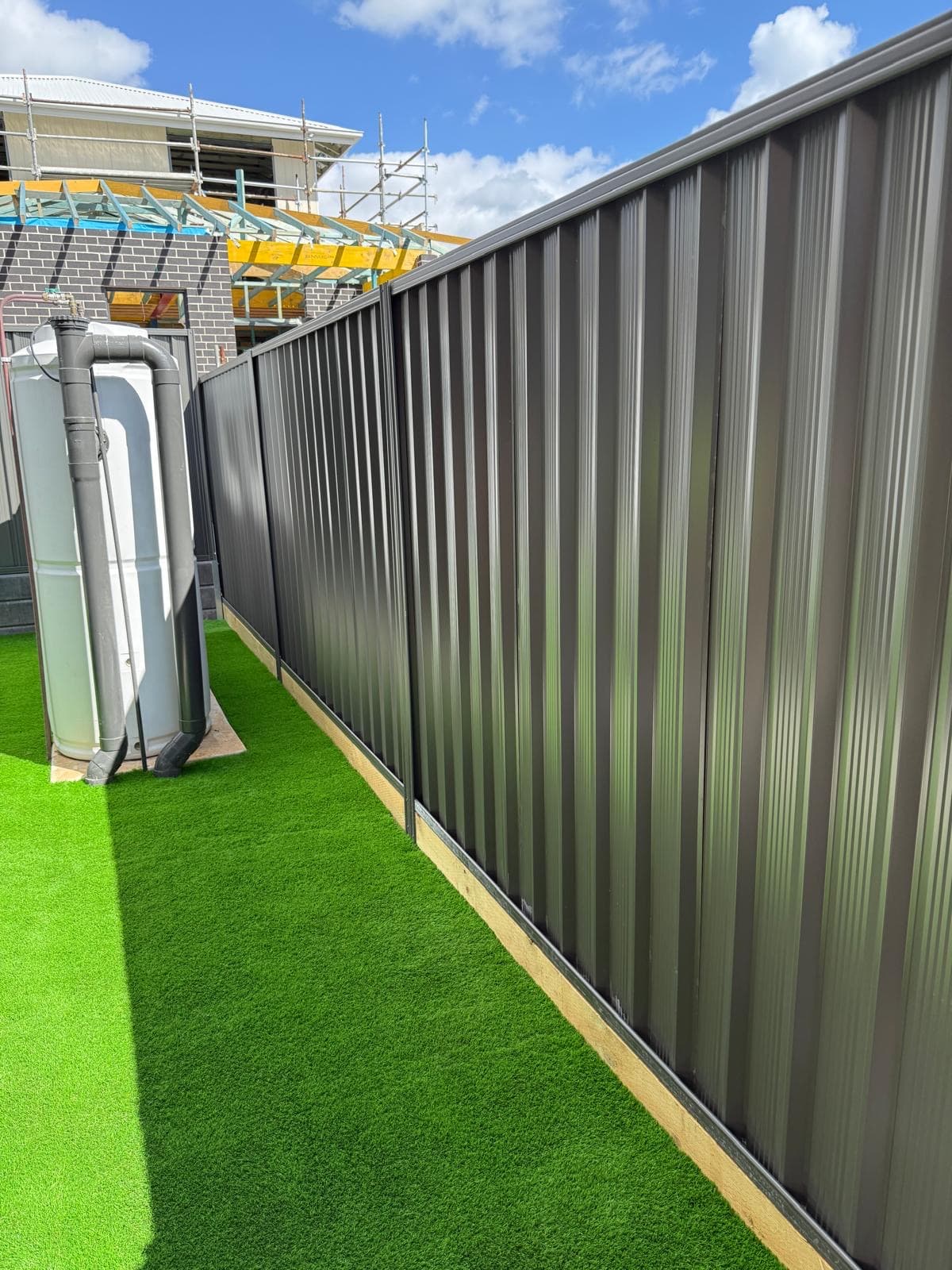 Contemporary garden pathway Sydney - bluestone pavers with pebble surrounds and garden lighting